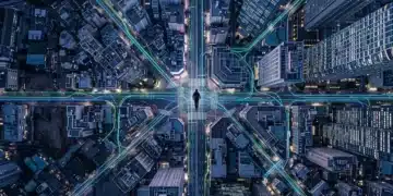 Aerial view of a person navigating a complex, glowing digital cityscape at dusk, representing the vast and overwhelming tech marketplace.